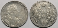 Рубль 1732 г. с брошью на груди, в легенде БМ...КАЯ между двух точек, крест державы узорчатый. (архив)