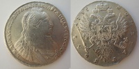 Рубль 1735 г. с кулоном из трех жемчужин на груди. (архив)