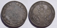 1,5 рубля - 10 злотых 1833 г. НГ, за 7 звеном лавровой ветви 3 ягоды. (архив)