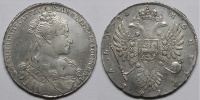 Рубль 1734 г., переходный тип, крест короны разделяет круговую надпись, 5 жемчужин в волосах. (архив)